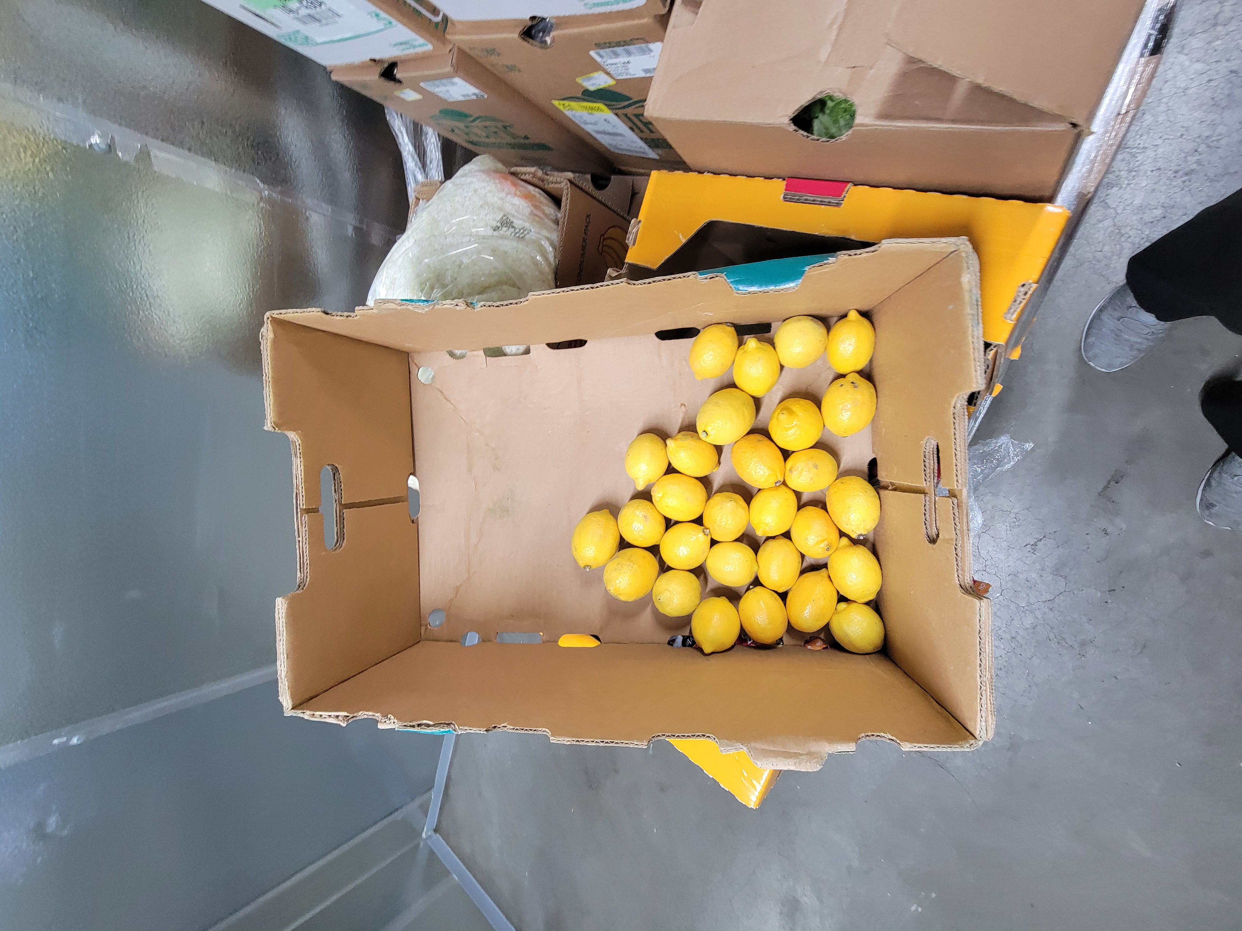 Lemons in a fruit box.